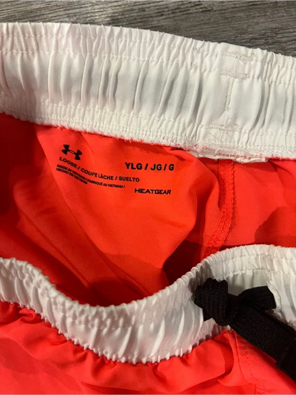 Under Armour Neon Coral and White Girls' Athletic Shorts